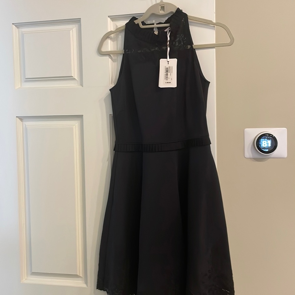 Brand new Ted Baker cocktail dress bought at Wynn boutique with all tags.